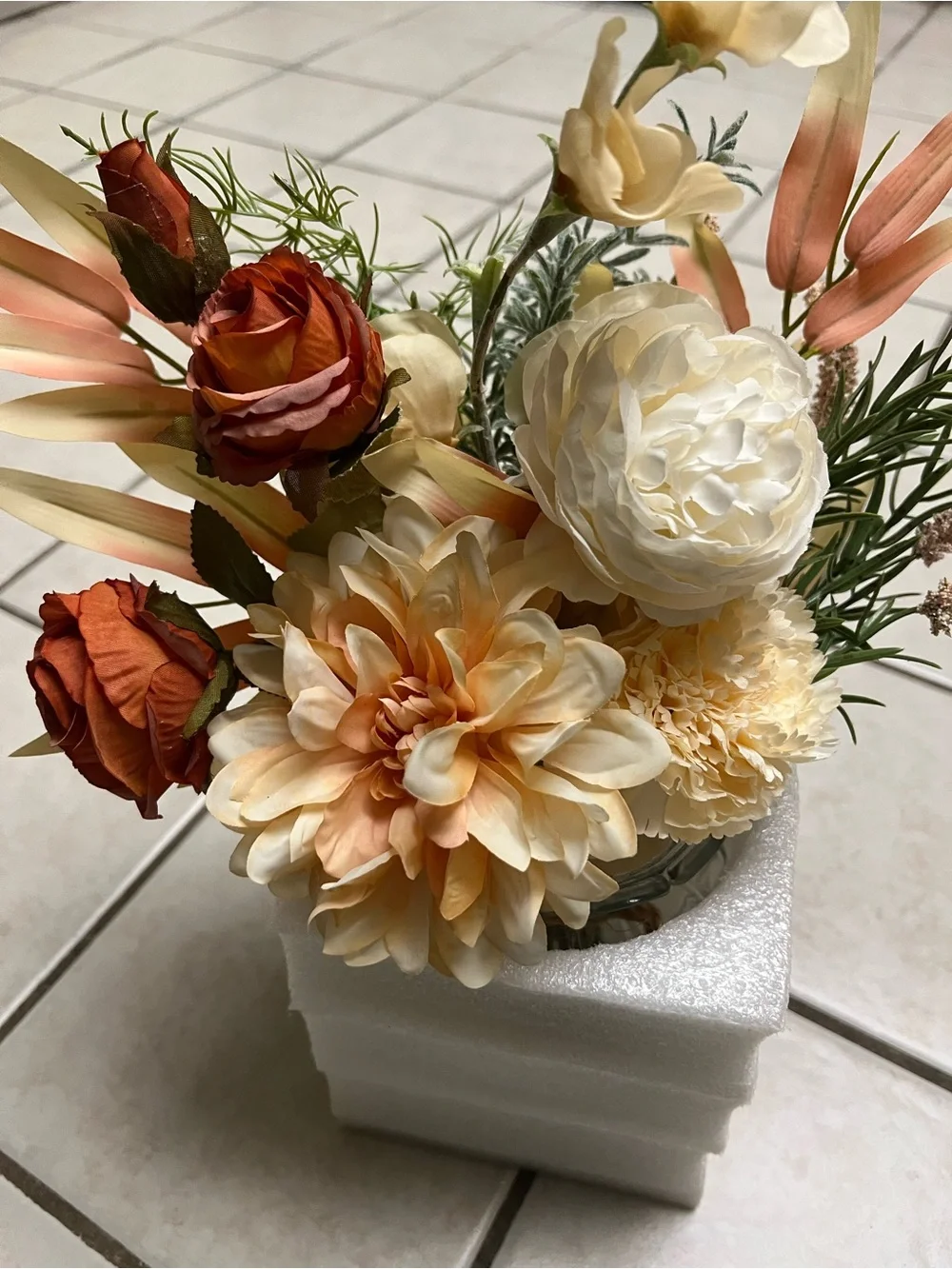Artificial Cream and Peach Floral Arrangement in Glass Vase
